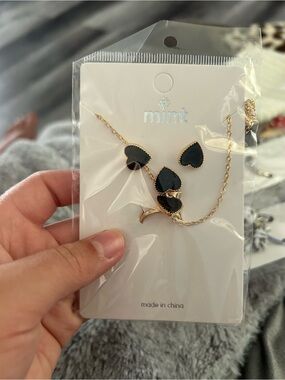 4/$50 Mint Gold-Tone Necklace with Black Heart Charms
